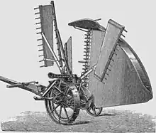 Moissonneuse (faucheuse-javeleuse) de McCormick, 1889. Elle produisait des javelles (gerbes non liées).