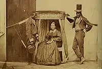 Femme se faisant transporter en chaise à porteurs par ses esclaves, à São Paulo, Brésil, en 1860.