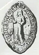 Photographie d'un sceau sur lequel est représenté une religieuse tenant une crosse.