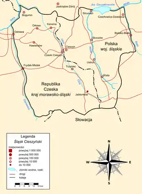 Carte de la Silésie de Cieszyn en polonais. La ligne noire épaisse représente la frontière historique de la région, tandis que la ligne noire en pointillés représente la frontière internationale.