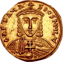 Photographie d'une face d'une pièce de monnaie, représentant le buste d'un homme.