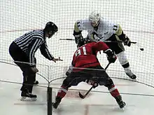 Photographie d'un engagement entre Staal  en blanc et Fiodorov en rouge.