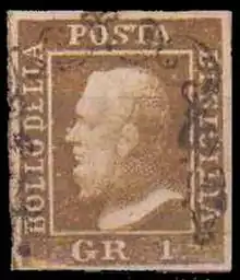 Photo d'un timbre bistre représentant la tête d'un vieil homme