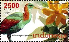 Reproduction d'un timbre horizontal représentant sur la gauche un oiseau au long bec jaune, à la tête, au ventre et au-dessus du dos verdâtres, et à l'arrière des ailes et au-dessus du cou bruns, et sur la droite une grande fleur jaune et orange.