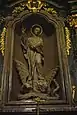 La statue de saint Bernard de l'église de Canzo, en Lombardie, réalisée en 1777 par Elia Vincenzo Buzzi, reprend le diable enchaîné de saint Bernard de Menthon et l'attribue à son homonyme, saint Bernard de Clairvaux.