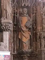 Photo de la statue polychrome de saint Étienne, sculptée par Pierre des Aubeaux en 1512