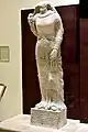 Statue acéphale de Qimi la fille d'Abdsimya, princesse de Hatra. Musée national d'Irak.
