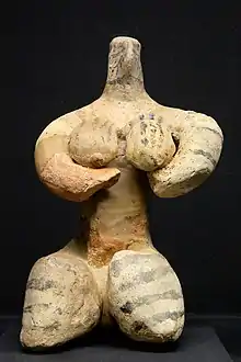 Figurine de parturiente assise de la période de Halaf. Musées royaux d'Art et d'Histoire de Bruxelles.