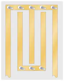 A stripline circuit consisting of a number of long parallel vertical lines. There are two horizontal lines with numerous short-circuit straps fed through holes to the board's ground plane. The vertical lines are alternately connected to the top and bottom horizontal lines. The free end of the first and last horizontal lines form the input and output respectively.