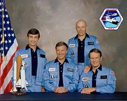 Donald H. Peterson, Paul J. Weitz, F. Story Musgrave et Karol J. Bobko