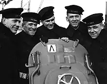 Les cinq frères Sullivan à bord du USS Juneau. De gauche à droite : Joseph, Francis, Albert, Madison et George Sullivan.