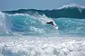 Surfeur sur le spot de Banzai Pipeline, Oahu, 2007, Hawaï.