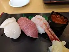 Hotategai, maguro-toro, ama ebi, ikura sushi.