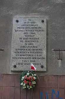 Plaque commémorative à Varsovie.
