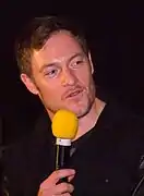 Tahmoh Penikett dans le rôle de Paul Ballard