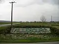 Monument décoratif indiquant la direction de Taillebourg