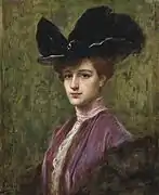 Élégante au chapeau noir (1900).