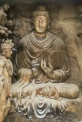 Buddha faisant le geste de l'enseignement, dharmacakra-mudrā.