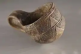 Tasse à gravure en sillons