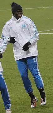 Taiwo lors d'un échauffement avec l'OM en 2010