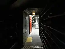 Tunnel passant sous la barrière