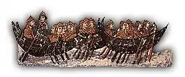 illustration en couleurs d'un manuscrit ancien : trois navires remplis de rameurs