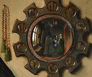 Détail du tableau de Jan van Eyck, Les Époux Arnolfini (1434). Les deux époux, de dos, ainsi que le peintre apparaissent dans le « miroir de sorcière ».