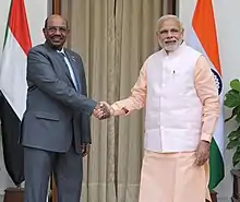 Rencontre entre deux hommes africain et indien