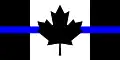 Le drapeau du Canada orné de la thin blue line.