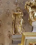 Détail sculpté du retable.