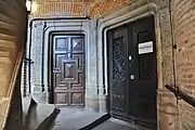 Portes au premier étage de la tour d'escalier de l'hôtel du Vieux-Raisin (entre 1515 et 1528).