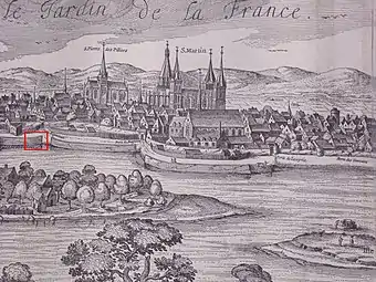 Dessin en noir en blanc d'une ville fortifiée au bord d'un cours d'eau, une partie du dessin encadrée en rouge.