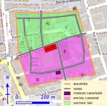 Séparation en quartiers d'une ville ancienne et de sa voirie reportés sur un plan moderne.