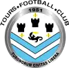 Logo rond cerclé d'argent avec trois tours, une salamandre et des scapulaire bleu ciel en son centre Au-dessus et dans le bas du cerclage, le nom et la devise du club.
