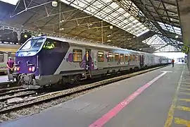 Voiture Corail réversible Haute-Normandie (2nd classe) en gare de Paris-Saint-Lazare (2011).