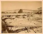 Au second plan, le pont Neuf peu avant sa démolition.