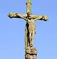 Le Tréhou : le Christ en croix au sommet du calvaire de l'enclos paroissial.