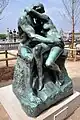 Le Baiser dans le jardin des Tuileries à Paris - bronze.