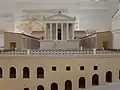 Maquette du forum à la fin du IIe siècle : portiques et Capitole avec vue sur le dispositif de retenue de la colline.