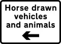 Plaque utilisée avec le panneau « Grille de bétail » pour l'indication du contournement des véhicules hippomobiles et des animaux