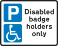 Parking place reserved for disabled badge holders only