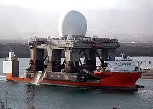 US Navy 060109-N-3019M-012 The heavy lift vessel MV Blue Marlin enters Pearl Harbor, Hawaii with the Sea Based X-Band Radar (SBX) aboard