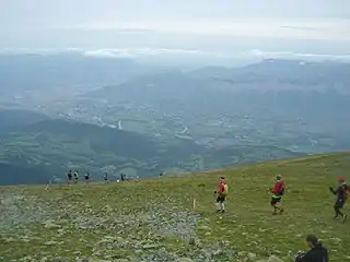 Début de la descente du Grand Colon et vue sur l'agglomération grenobloise.