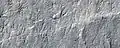 Vue d'une partie d'Ultimi Scopuli prise par HiRISE le 8 juillet 2009