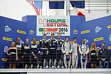 Podium de la catégorie LMP3 des 4 Heures d'Estoril 2016, avec Yvan Muller en invité tout à droite.