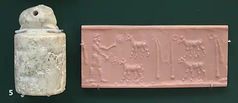 Sceau-cylindre et impression, représentant la figure du « roi-prêtre » en pasteur nourrissant des moutons. British Museum.