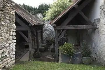 Le lavoir de 1838, rebâti en 1858, au bout de l'impasse du Lavoir..