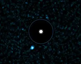 Image VLT de l'exoplanète HD 95086 b(tache bleue) et de son étoile.