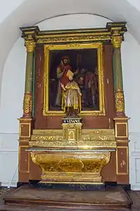 Retable de saint Benoit et statue de saint Venance, chapelle latérale.