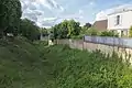 Les fossés de la Porte de Mortagne : ancienne défense du château devenue « la Gueule d'enfer », lieu de promenade.